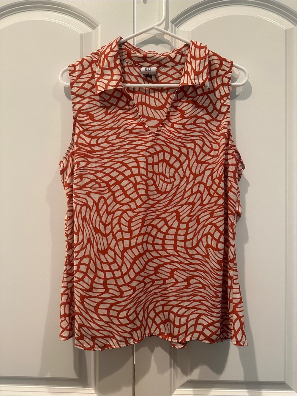 CAbi Sleeveless Collared V-Neck Blouse in Rust and Cream